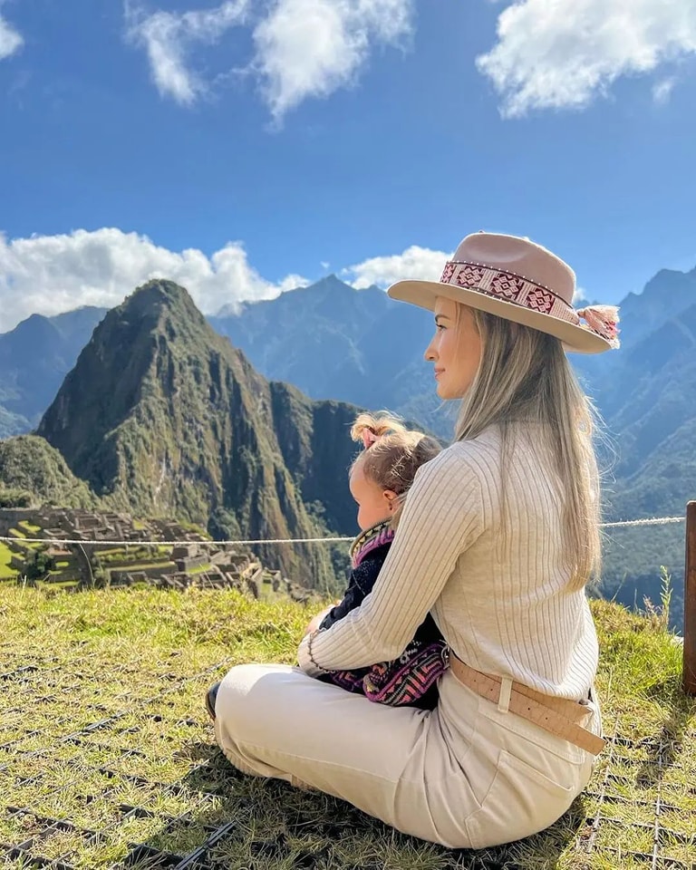 Mother with her child at Machu Picchu citadel