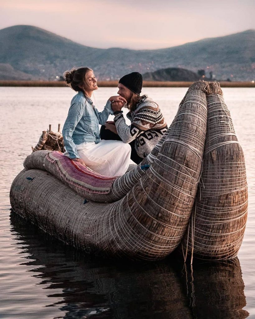 Couple on top of the reed horse, Lake Titicaca